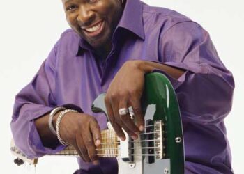 Power Forward: Wayman Tisdale Thrilled Us With A Basketball, Guitar, And A Smile
