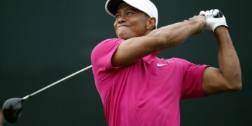 TIGER WOODS IS THE ENGINE THAT DRIVES THE GOLF WORLD